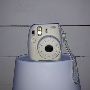 Polaroid camera and a full pack of instant film